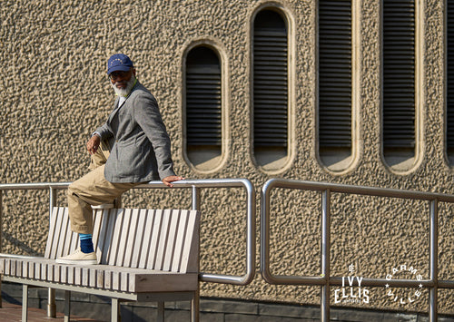 Jules Jordan sitting outside the Barbican, London